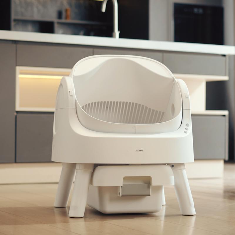 Happy cat owner with LitterLux